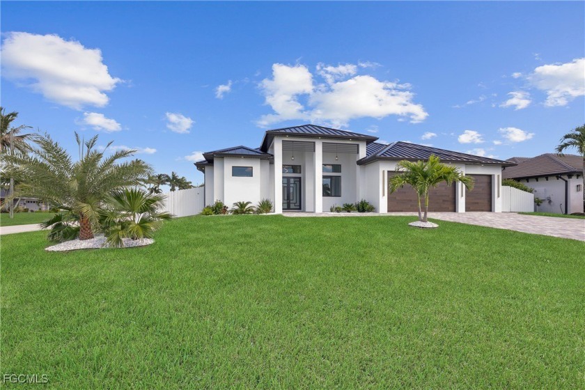 Step into elegance with this stunning 4-bedroom, 3-bathroom New - Beach Home for sale in Cape Coral, Florida on Beachhouse.com