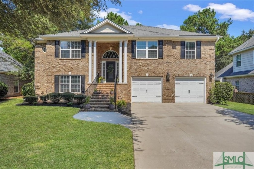 Come see this elegant brick home overlooking the 14th fairway of - Beach Home for sale in Savannah, Georgia on Beachhouse.com