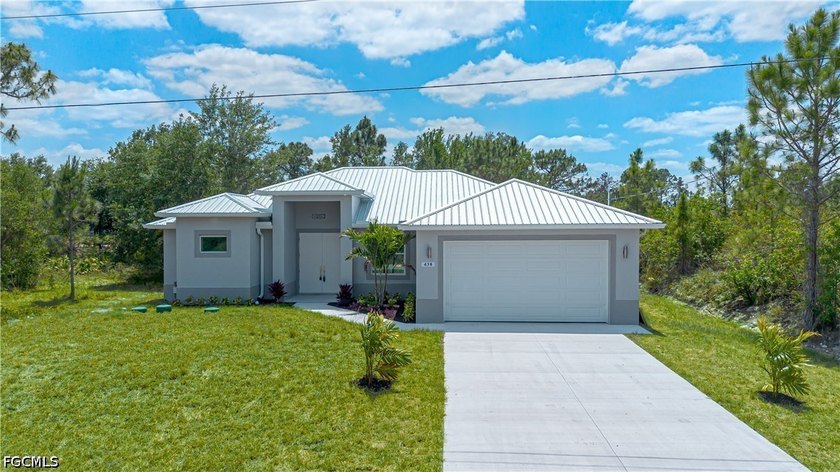 Welcome to this beautifully designed brand New Construction - Beach Home for sale in Lehigh Acres, Florida on Beachhouse.com