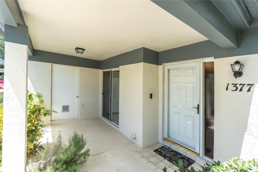 Villa-Style Condo with courtyard patio, screened lanai and - Beach Condo for sale in Clearwater, Florida on Beachhouse.com