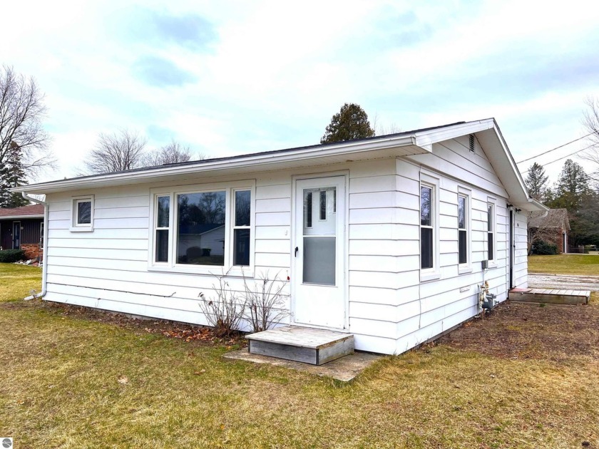 Very cute home on a corner lot in a quiet desirable - Beach Home for sale in East Tawas, Michigan on Beachhouse.com