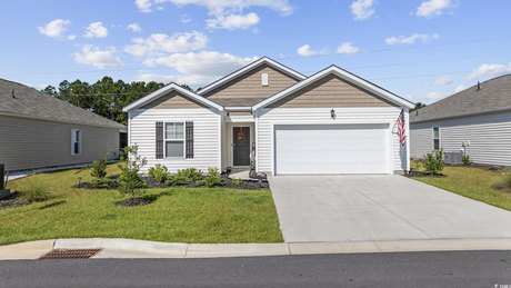 Welcome to this nearly new home constructed in 2023! Featuring 3 - Beach Home for sale in Longs, South Carolina on Beachhouse.com