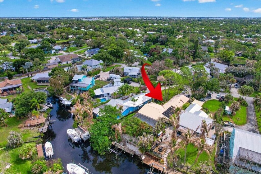 This waterfront gem in the beautiful community of Rustic Hills - Beach Home for sale in Palm City, Florida on Beachhouse.com