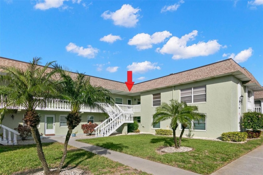 WELCOME TO THE GREEN DOLPHIN! This beautifully updated end-unit - Beach Condo for sale in Tarpon Springs, Florida on Beachhouse.com