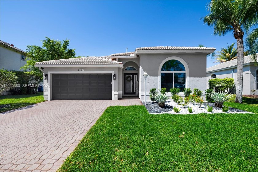 This beautifully upgraded waterfront home in Bimini Bay at - Beach Home for sale in Pembroke Pines, Florida on Beachhouse.com