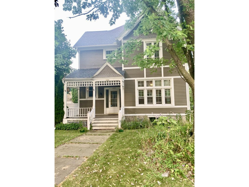 Only available due to relocation, this charming 1800s home is - Beach Home for sale in Sheboygan, Wisconsin on Beachhouse.com