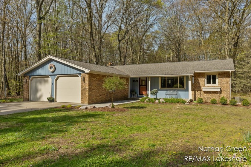 Discover this updated 3 bed/3 bath ranch with a pole barn - Beach Home for sale in Holland, Michigan on Beachhouse.com