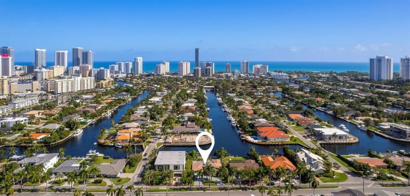 Nestled within the gated waterfront Golden Isles community, this - Beach Home for sale in Hallandale Beach, Florida on Beachhouse.com