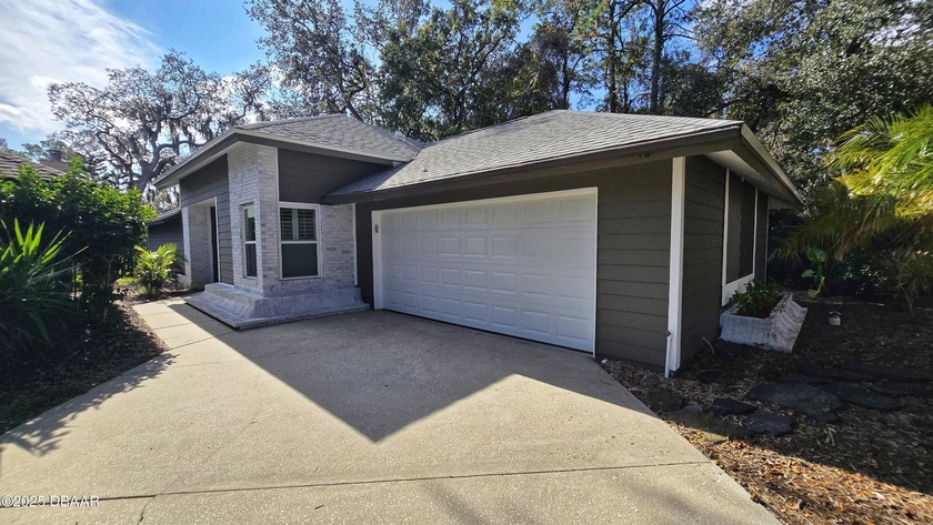 Fully renovated waterfront home in the sought after Riverwood - Beach Home for sale in Port Orange, Florida on Beachhouse.com