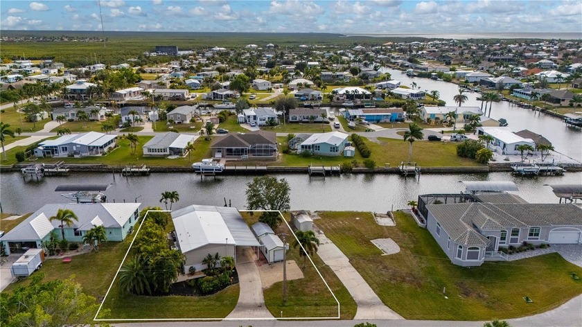 ATTENTION ALL BOATERS! This 3BR/2BTH, Fleetwood Manufactured - Beach Home for sale in Punta Gorda, Florida on Beachhouse.com