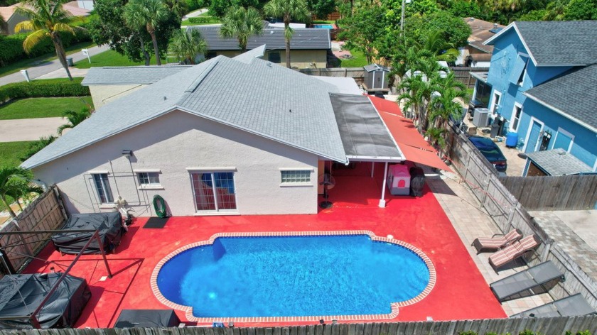 Welcome to this beautifully renovated corner home situated on a - Beach Home for sale in Delray Beach, Florida on Beachhouse.com