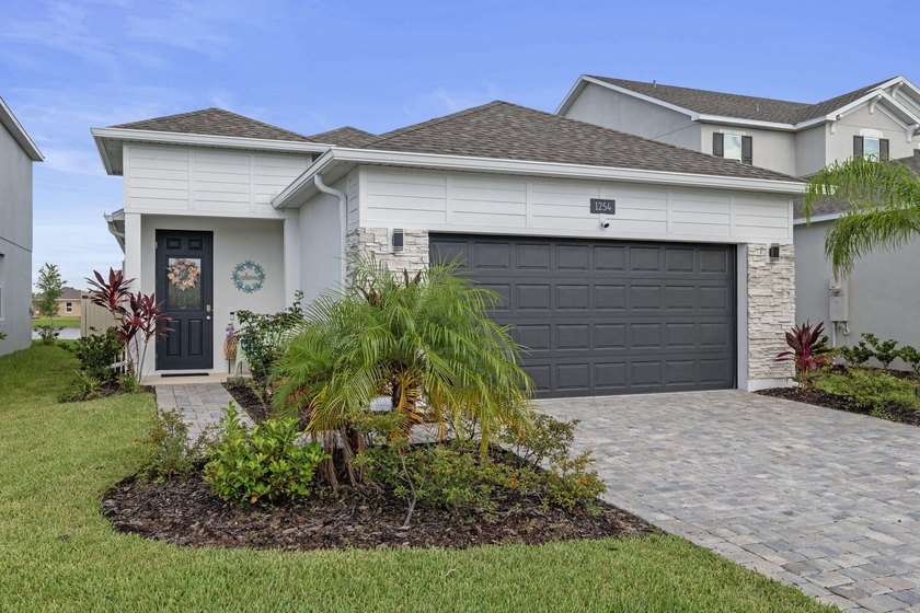 Newly Built in 2023, 3/2/2 Lake Front Home with many upgrades - Beach Home for sale in Palm Bay, Florida on Beachhouse.com