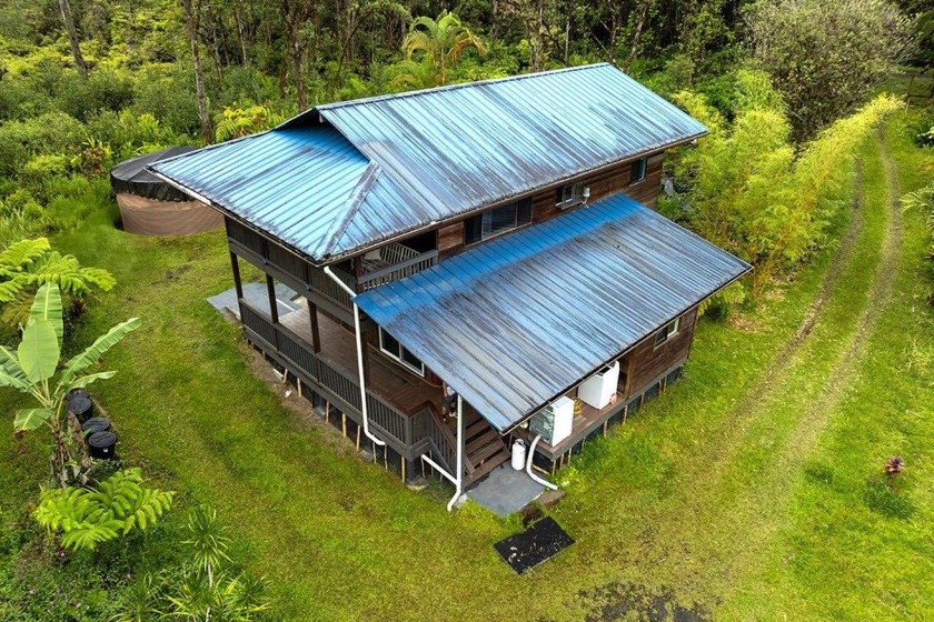 Discover this charming 1,400+ square foot custom cedar home - Beach Home for sale in Mountain View, Hawaii on Beachhouse.com