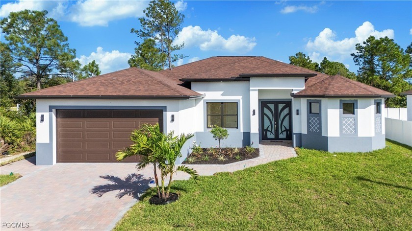 NEW CONSTRUCTION - With French door entry, which gives the - Beach Home for sale in Lehigh Acres, Florida on Beachhouse.com
