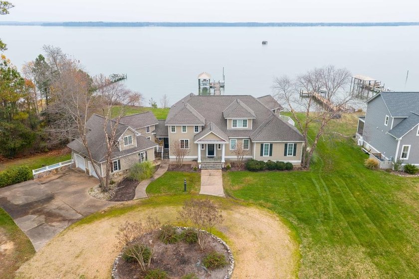 This custom designed classic coastal river home is set on 2.82 - Beach Home for sale in Dunnsville, Virginia on Beachhouse.com