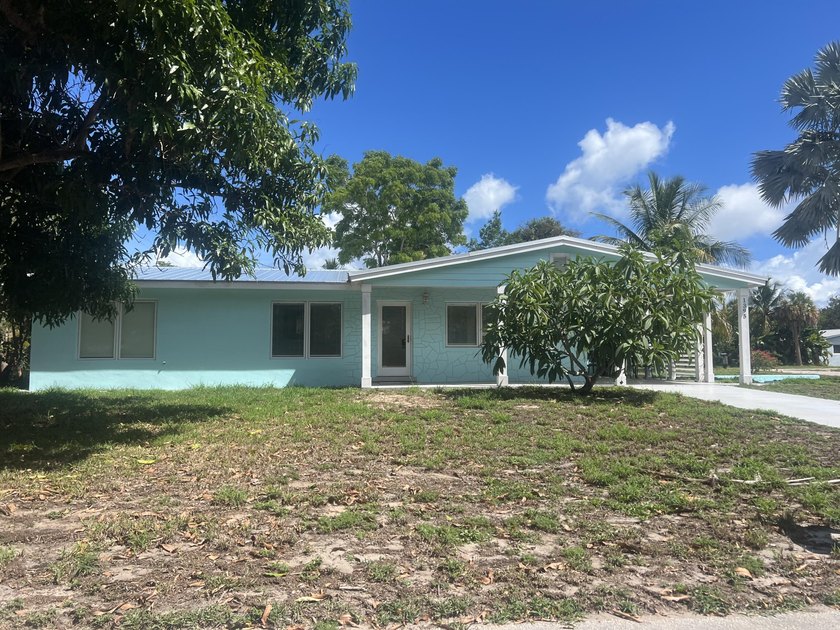 Single family home with 2 driveways 3-bedroom 2 bath on a large - Beach Home for sale in Jensen Beach, Florida on Beachhouse.com