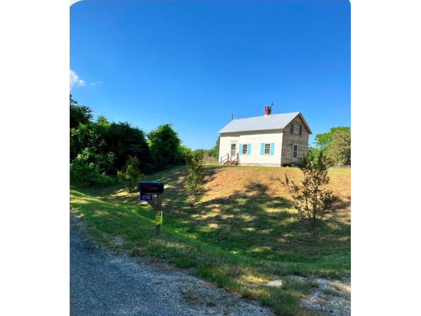 Nestled atop a picturesque hill, this cozy 780 sq. ft. home is - Beach Home for sale in Heathsville, Virginia on Beachhouse.com