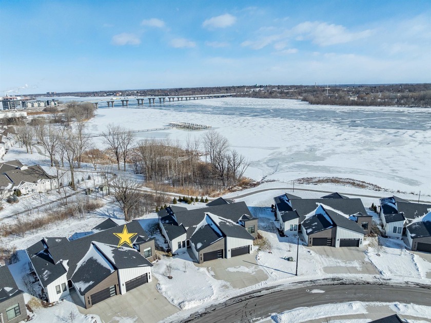 This beautiful water front, three-bedroom, open-concept home - Beach Home for sale in Green Bay, Wisconsin on Beachhouse.com