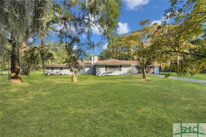 Welcome to 356 Lake Drive! As you approach, you'll be captivated - Beach Home for sale in Midway, Georgia on Beachhouse.com