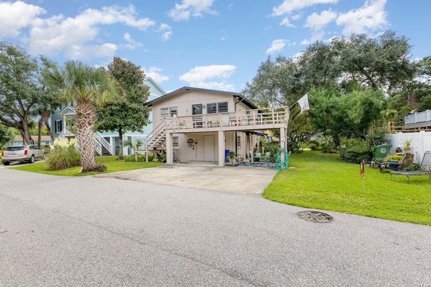 Tucked away from the hustle and bustle, you'll find this awesome - Beach Home for sale in Surfside Beach, South Carolina on Beachhouse.com