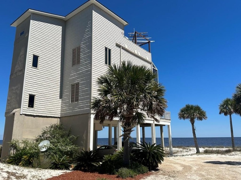 Welcome to your exclusive slice of paradise on the serene shores - Beach Home for sale in Alligator Point, Florida on Beachhouse.com