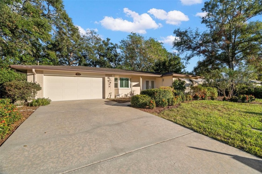 Highly sought after Fairway Estates home in delightful Dunedin - Beach Home for sale in Dunedin, Florida on Beachhouse.com