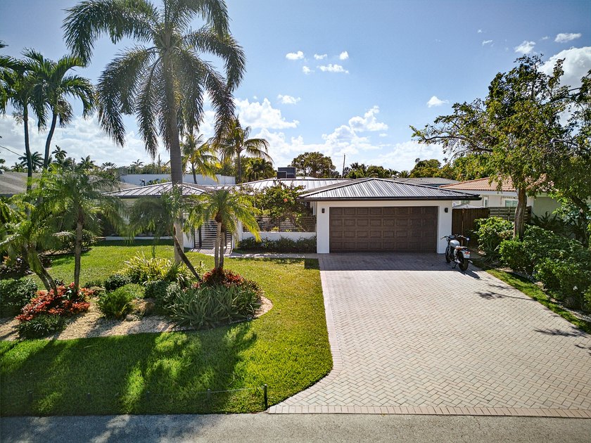 This beautifully updated home featuring a spacious open kitchen - Beach Home for sale in Wilton Manors, Florida on Beachhouse.com