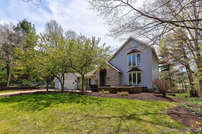 Discover the perfect retreat for anyone seeking a serene - Beach Home for sale in Spring Lake, Michigan on Beachhouse.com