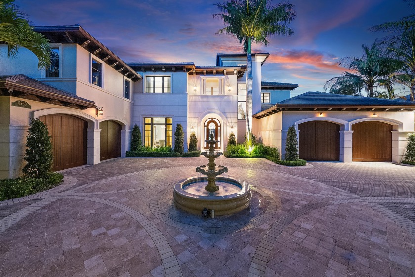 As you step into the exquisite entrance of this luxurious estate - Beach Home for sale in Palm Beach Gardens, Florida on Beachhouse.com