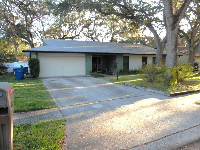 Nestled in a peaceful and highly desirable neighborhood, this - Beach Home for sale in Clearwater, Florida on Beachhouse.com