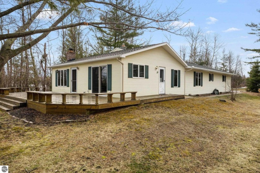 Experience lakeside living in Elk Rapids with this 3 bedroom, 3 - Beach Home for sale in Elk Rapids, Michigan on Beachhouse.com