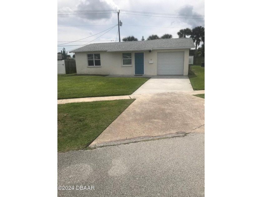 Steps to the beach. Fantastic beach side bungalow with tile - Beach Home for sale in Ormond Beach, Florida on Beachhouse.com