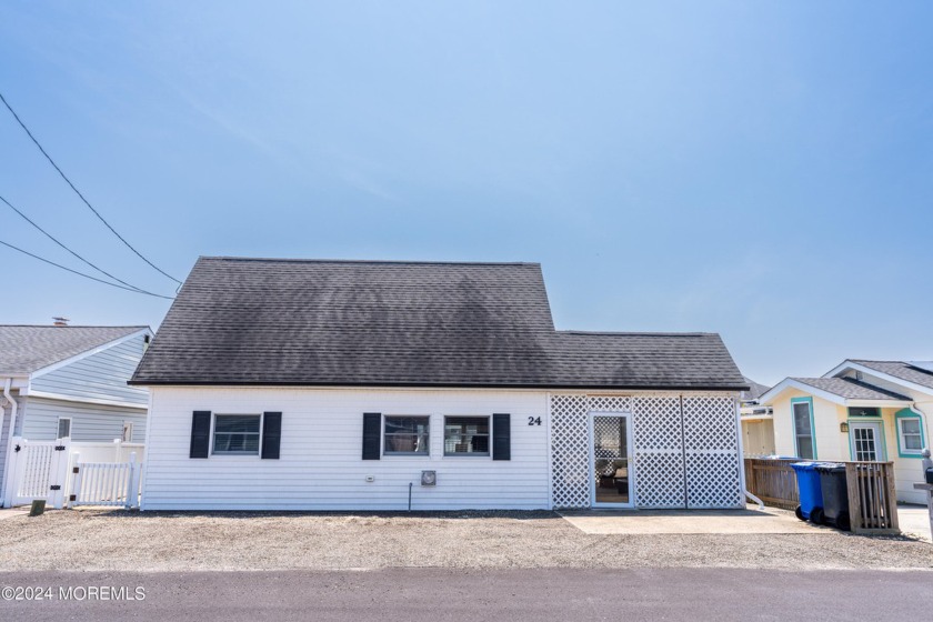 Bring your bathing suit, hitch the boat and become part of the - Beach Home for sale in Beach Haven West, New Jersey on Beachhouse.com