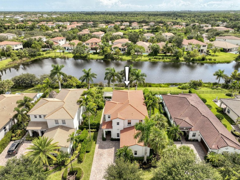 Serene lakefront and sunset views are breathtaking from this - Beach Home for sale in Jupiter, Florida on Beachhouse.com