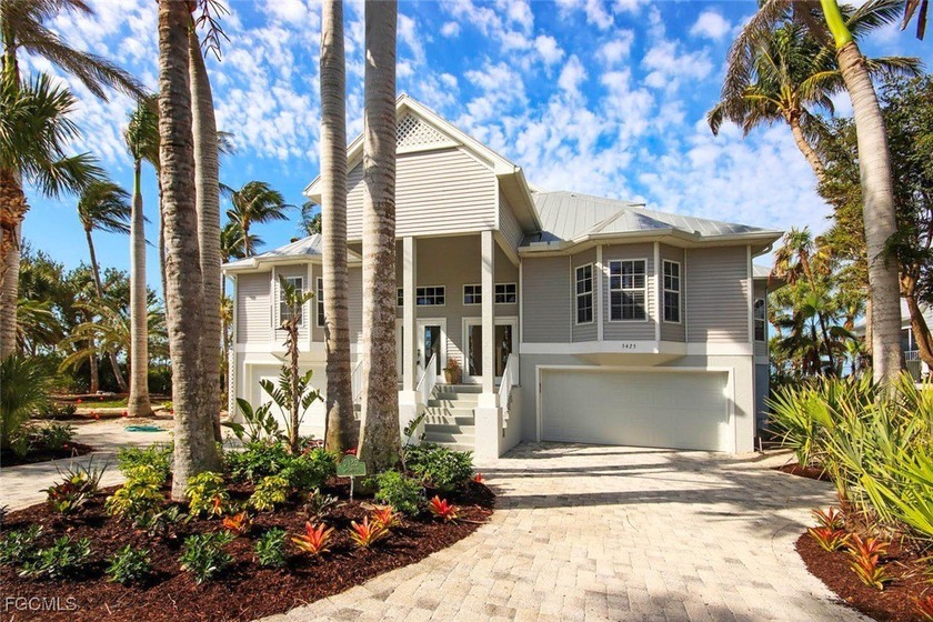 This one will make you smile . . . Experience island living in - Beach Home for sale in Sanibel, Florida on Beachhouse.com