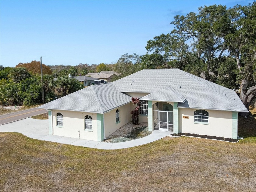 Welcome to this Wonderful 3 bedroom, 2 bathroom, Open, Split - Beach Home for sale in Port Charlotte, Florida on Beachhouse.com