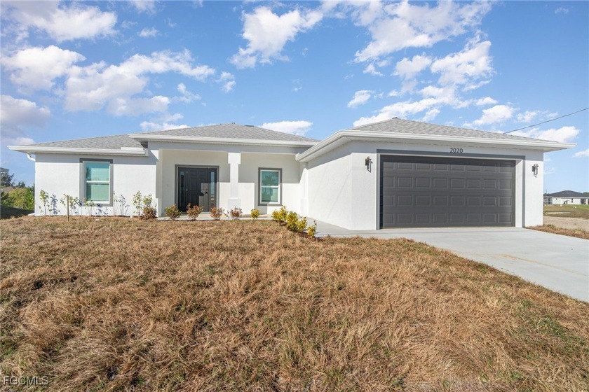 Brand new 4 bedroom 3 full bath 2 car garage freshwater canal - Beach Home for sale in Cape Coral, Florida on Beachhouse.com