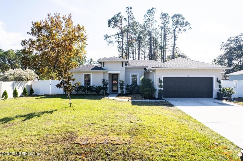 This contemporary Palm Coast home offers a bright, open layout - Beach Home for sale in Palm Coast, Florida on Beachhouse.com