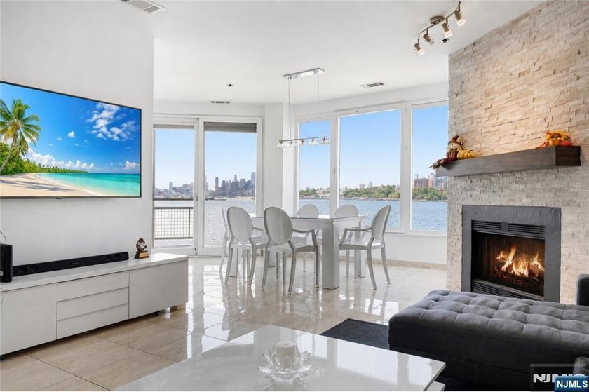 Enjoy phenomenal views of the Hudson River and NYC skyline from - Beach Condo for sale in Weehawken, New Jersey on Beachhouse.com