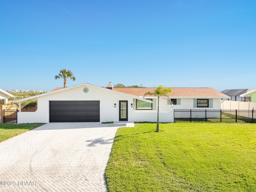 Experience the pinnacle of coastal elegance in this impeccably - Beach Home for sale in Ponce Inlet, Florida on Beachhouse.com