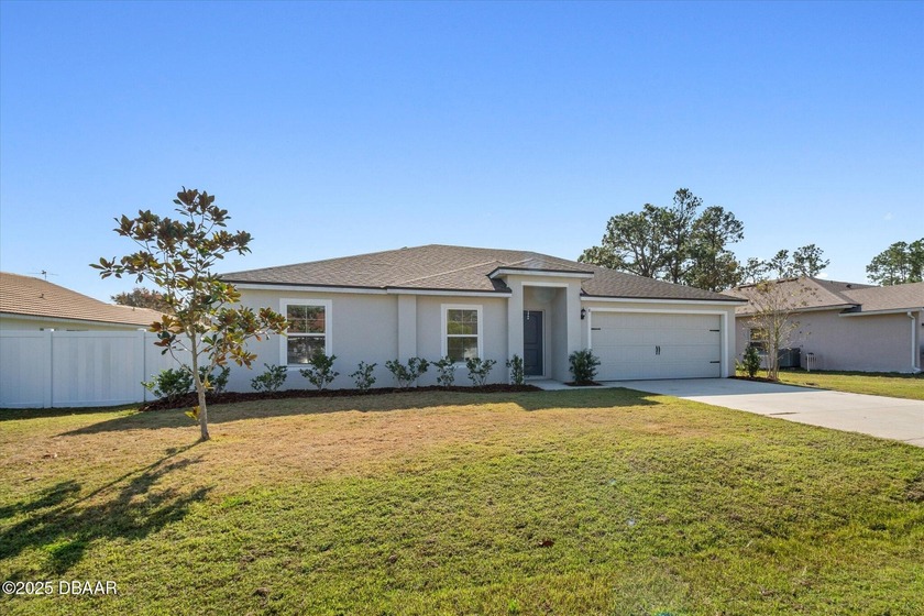 Welcome to this beautifully maintained 3-bedroom, 2-bath home - Beach Home for sale in Palm Coast, Florida on Beachhouse.com