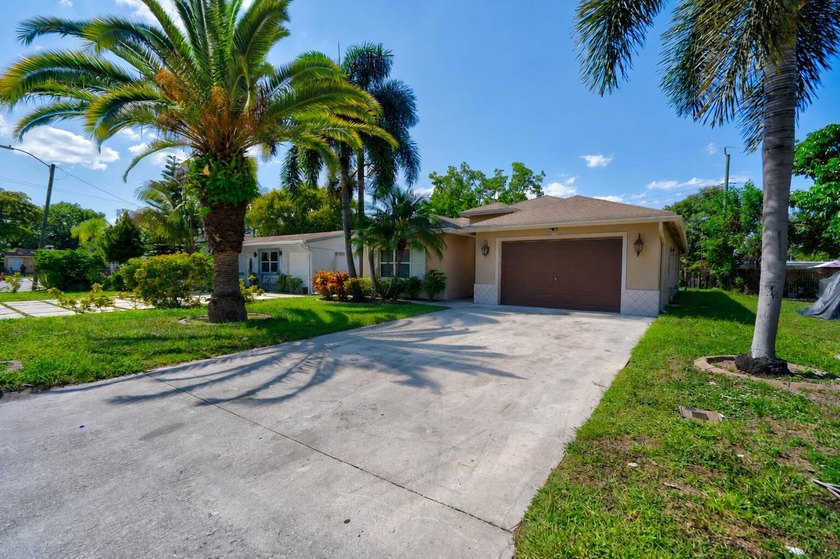 Spacious 4-bedroom, 2-bath single-family home offering - Beach Home for sale in Pompano Beach, Florida on Beachhouse.com