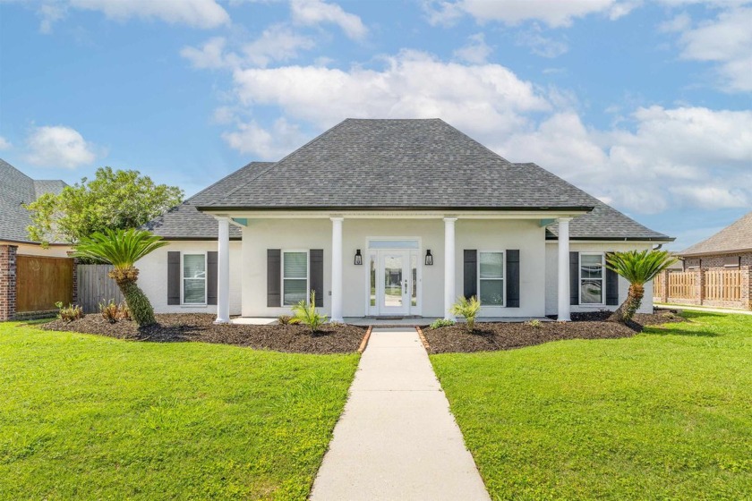 THIS PRISTINE WATERFRONT HOME FEATURES 3 BEDROOMS, 2  1/2 - Beach Home for sale in Houma, Louisiana on Beachhouse.com