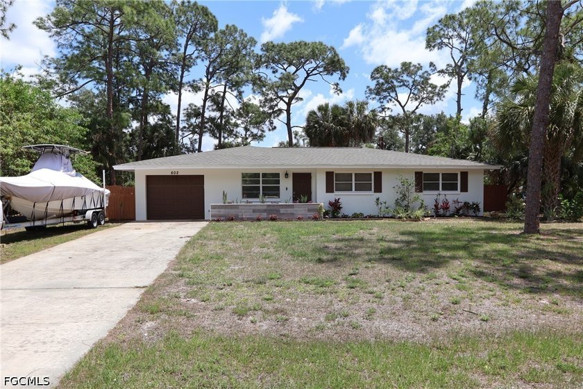 This home is situated on a half-acre on a quiet street in Lehigh - Beach Home for sale in Lehigh Acres, Florida on Beachhouse.com