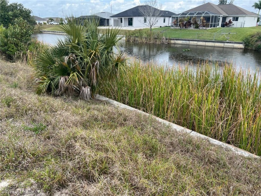 Embrace waterfront living on Cape Coral's Freedom Canal. This - Beach Lot for sale in Cape Coral, Florida on Beachhouse.com