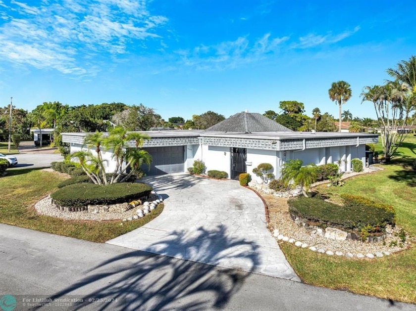 This home is the epitome of mid-century charm in this - Beach Home for sale in Tamarac, Florida on Beachhouse.com