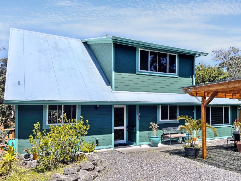 Situated in the lush serenity of Volcano Golf Course - Beach Home for sale in Volcano, Hawaii on Beachhouse.com