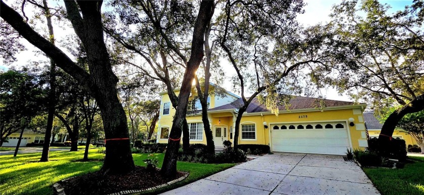 This stunning home is nestled in the gated community of Forest - Beach Townhome/Townhouse for sale in Palm Harbor, Florida on Beachhouse.com