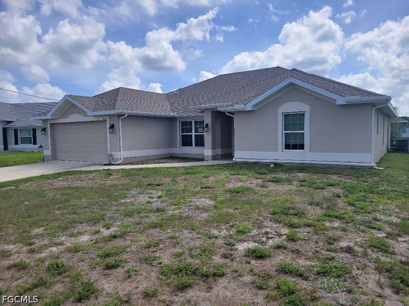 AMAZING 4BR/3BA OVER 2,000 sq. ft. of Living Area with Soaring - Beach Home for sale in Lehigh Acres, Florida on Beachhouse.com
