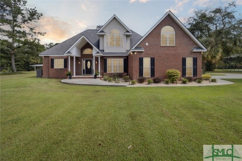 Welcome to your dream home nestled on a lake in the picturesque - Beach Home for sale in Midway, Georgia on Beachhouse.com